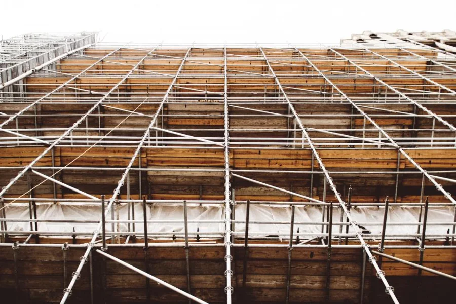Rows of scaffolding around a building under construction